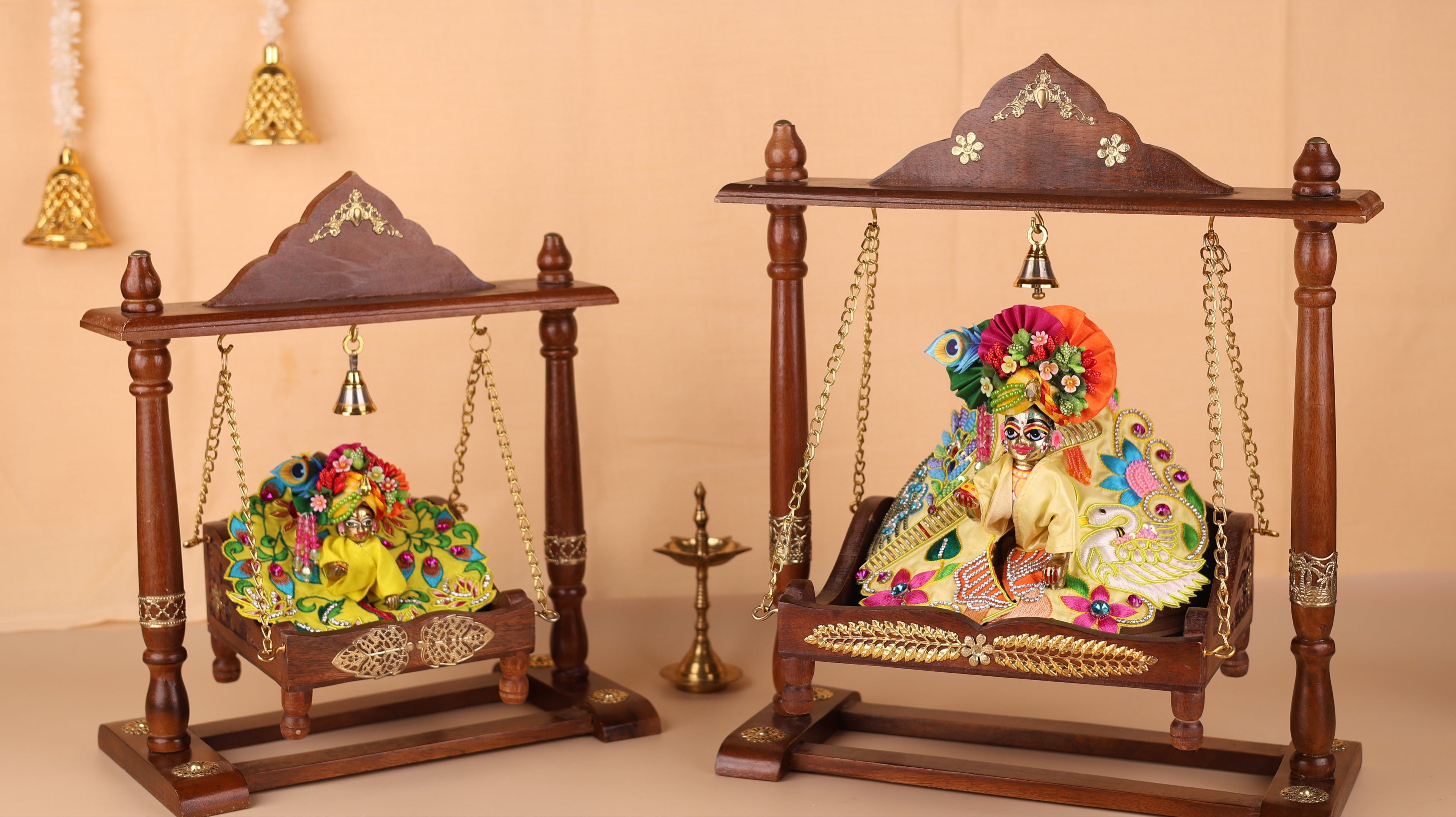 Wooden Jhula for Laddu Gopal for Janmashtami celebrations - handcrafted and adorned with elegant golden elements and chains