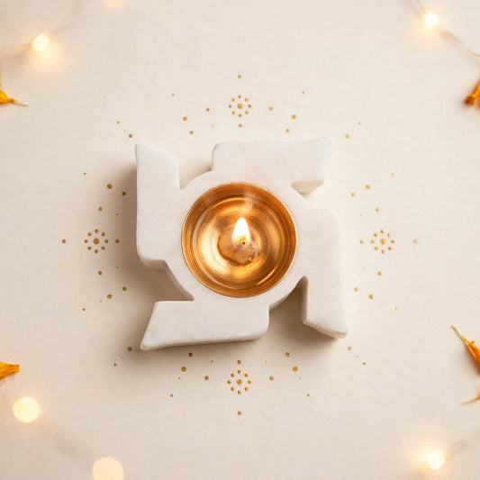 Marble Swastik with Brass Diya